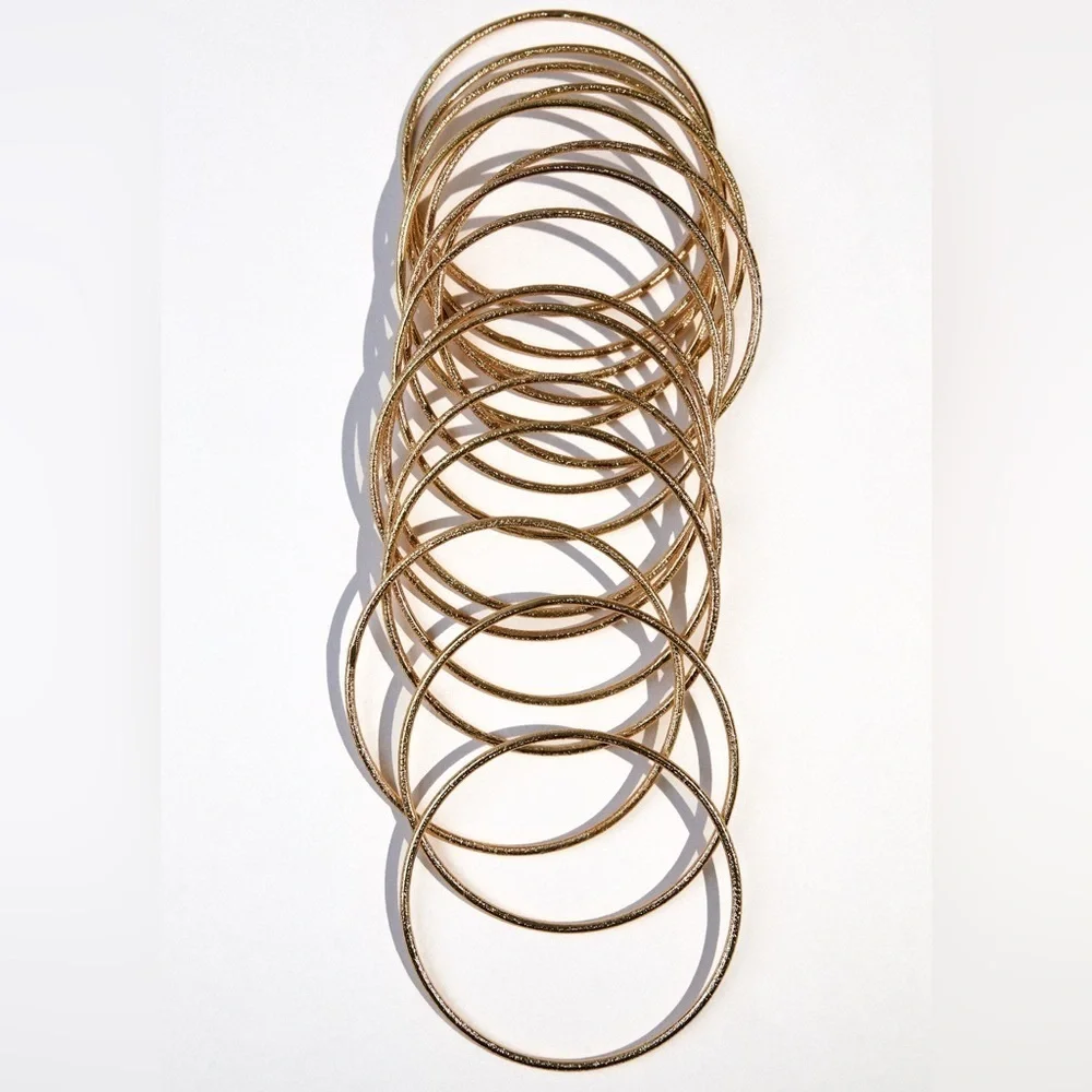 NWT. Zara Golden Pack of Multiple Textured Metal Bracelets.